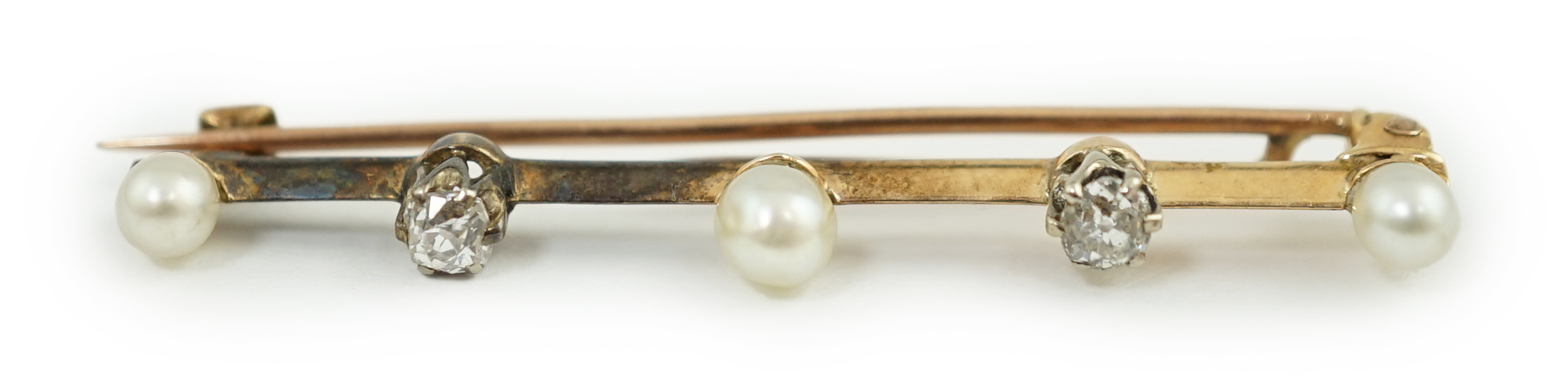 An Edwardian gold, pearl and diamond bar brooch